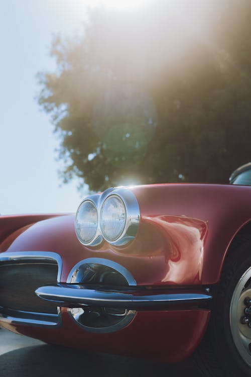 Headlights of Classic Red Chevrolet Corvette