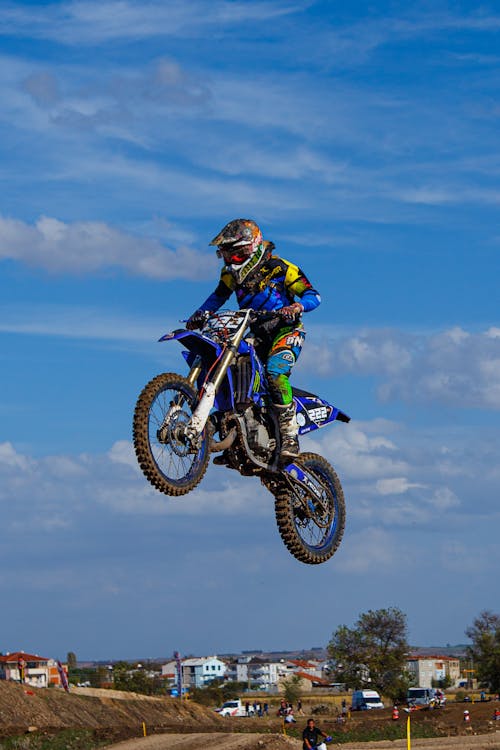 A Man Jumping on a Motorbike