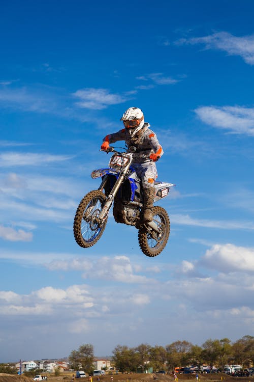 A Man Jumping on a Motorbike