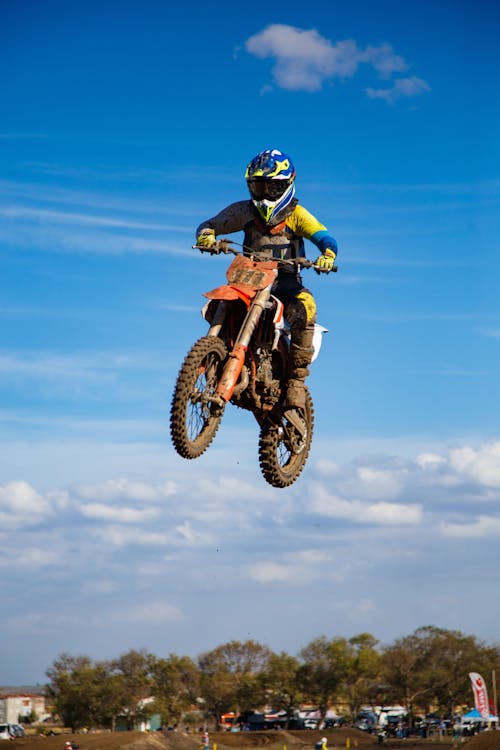 Rider with Helmet on Motocross in Air