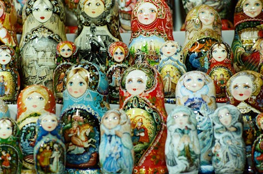 Handcrafted Russian Matryoshka dolls with traditional designs on display in Moscow.