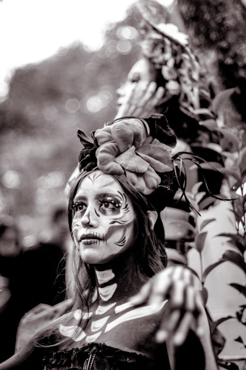 Portrait of Woman with Painted Face as Catrina in Black and White