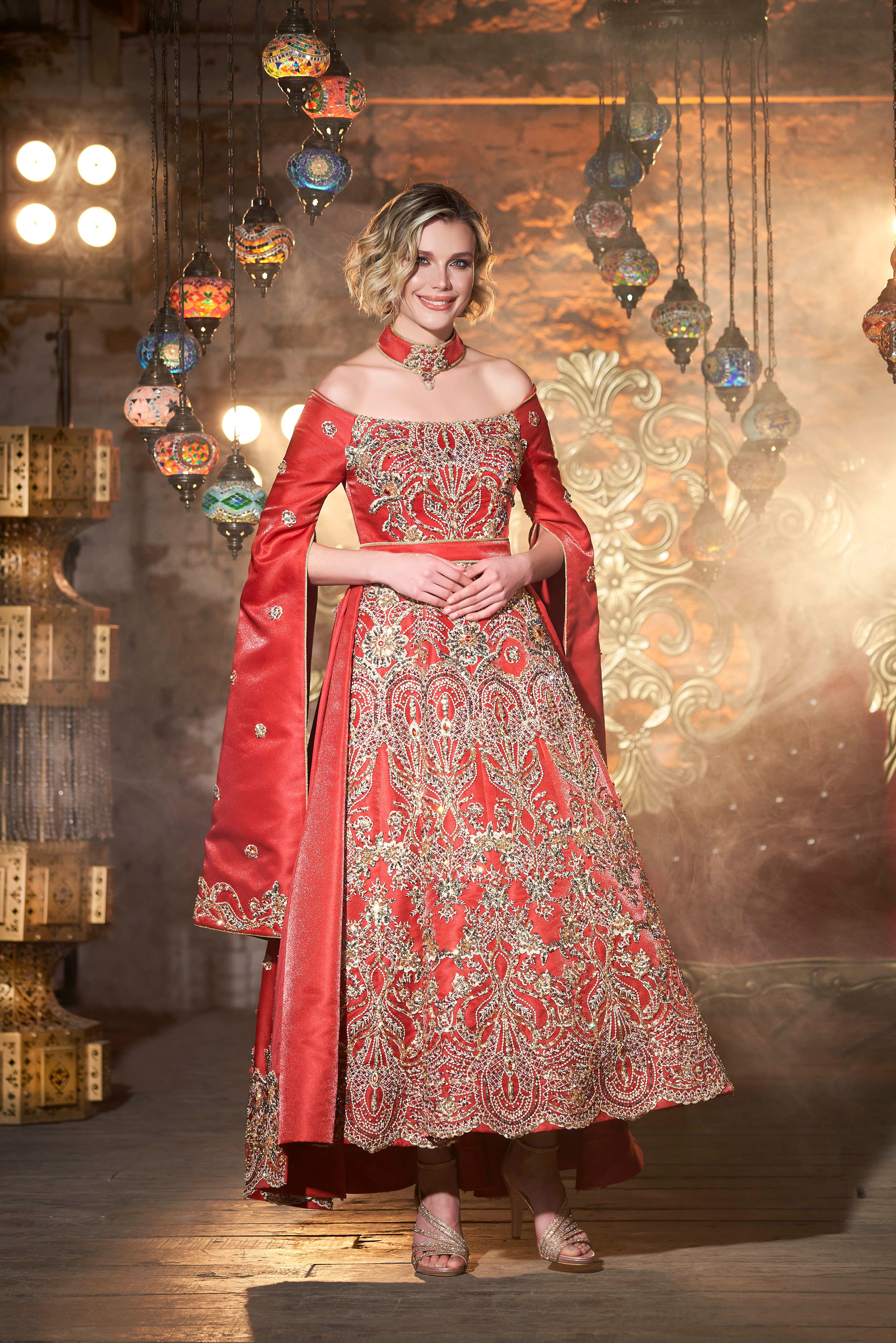 A woman in a beautiful red traditional Turkish dress in İzmir, Turkey.