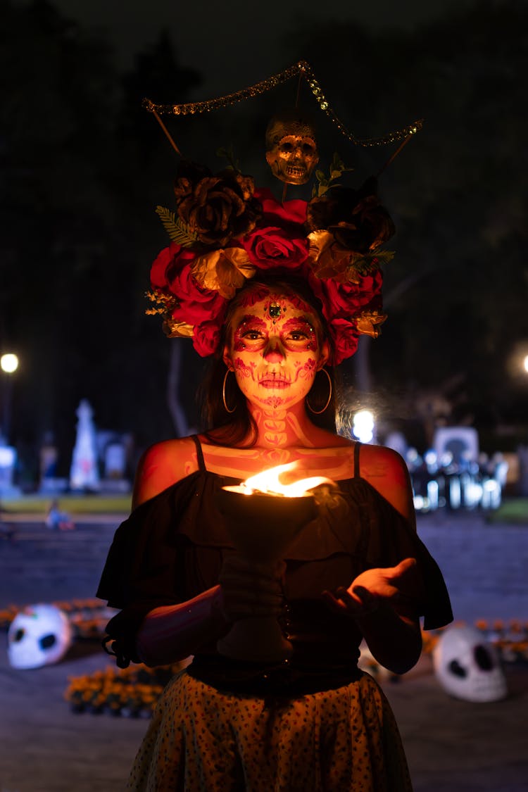 La Calavera Catrina With A Burning Chalice In The Graveyard At Night