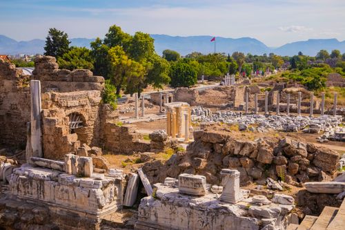 Free Explore the ancient ruins of Side in Antalya, showcasing historic columns and rocky landscapes. Stock Photo