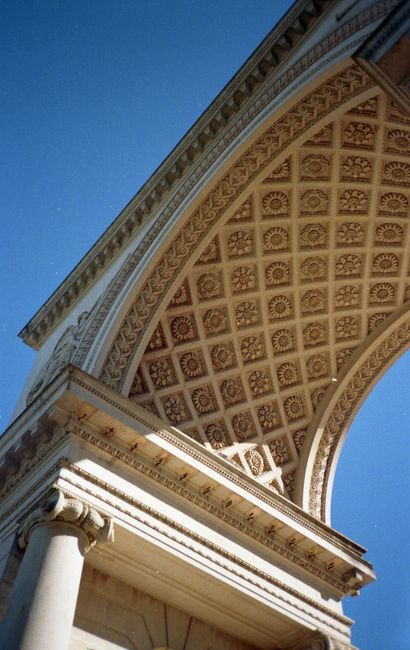 Close-up of a neoclassical arch showcasing intricate designs in San Francisco, CA.