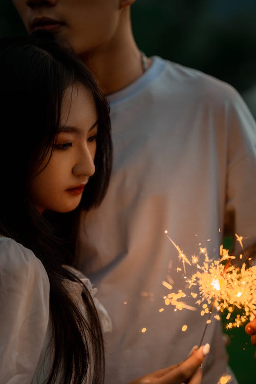 Woman and Man with Sparkler