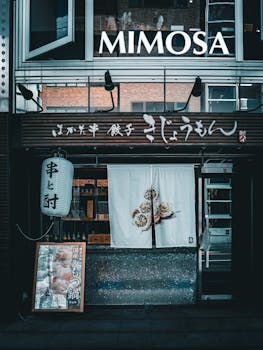 Explore a Japanese restaurant with distinct signage and décor in urban Nagoya, Japan.