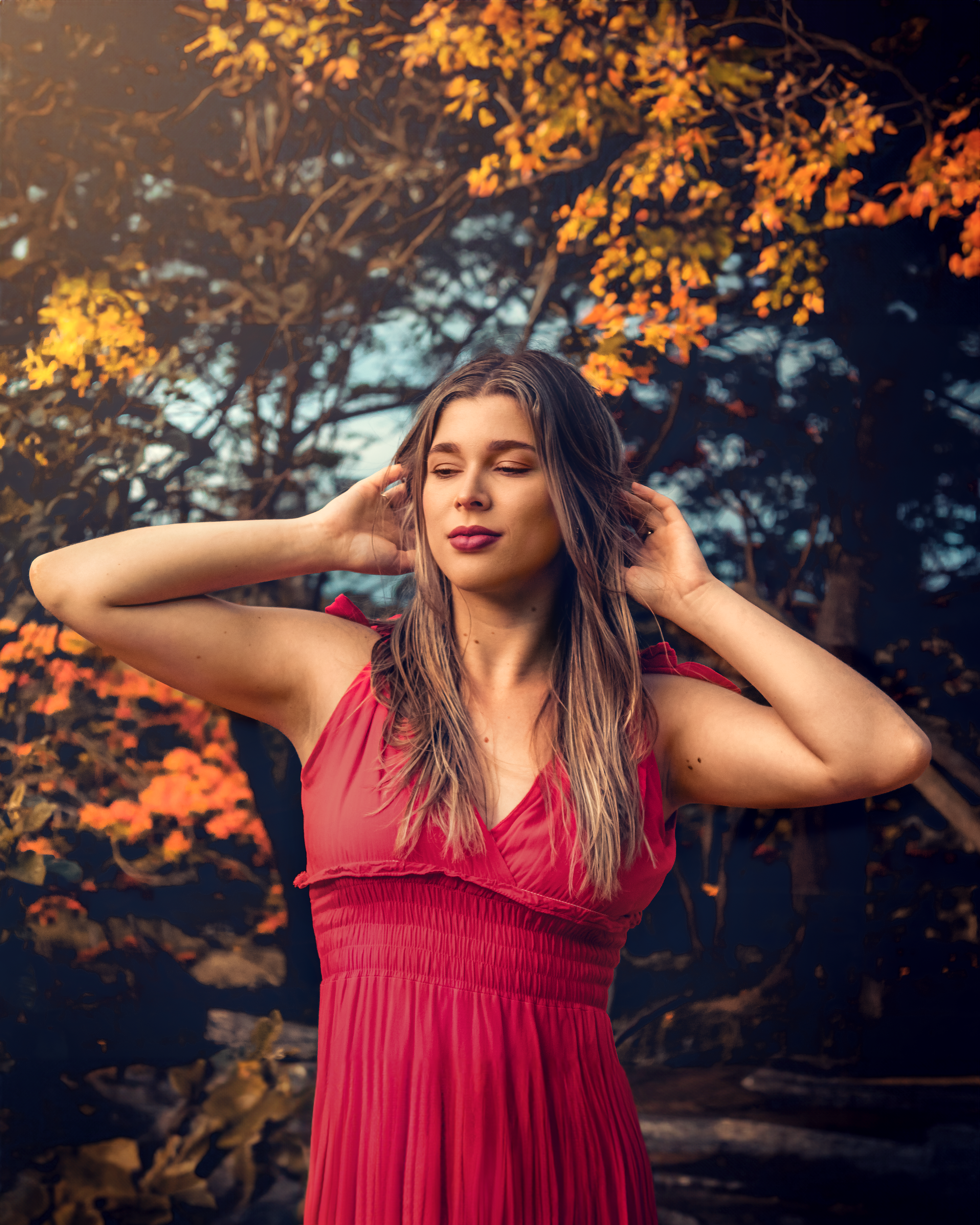 Woman Posing in a Red Dress · Free Stock Photo