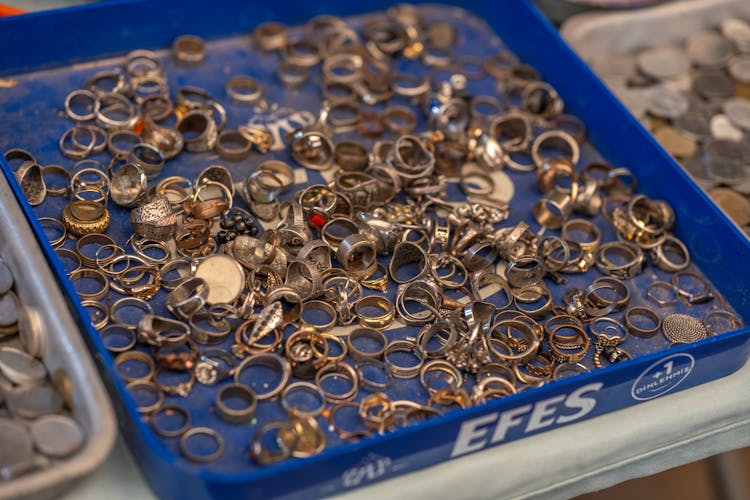 Close-up Of A Plastic Container With Jewelry 