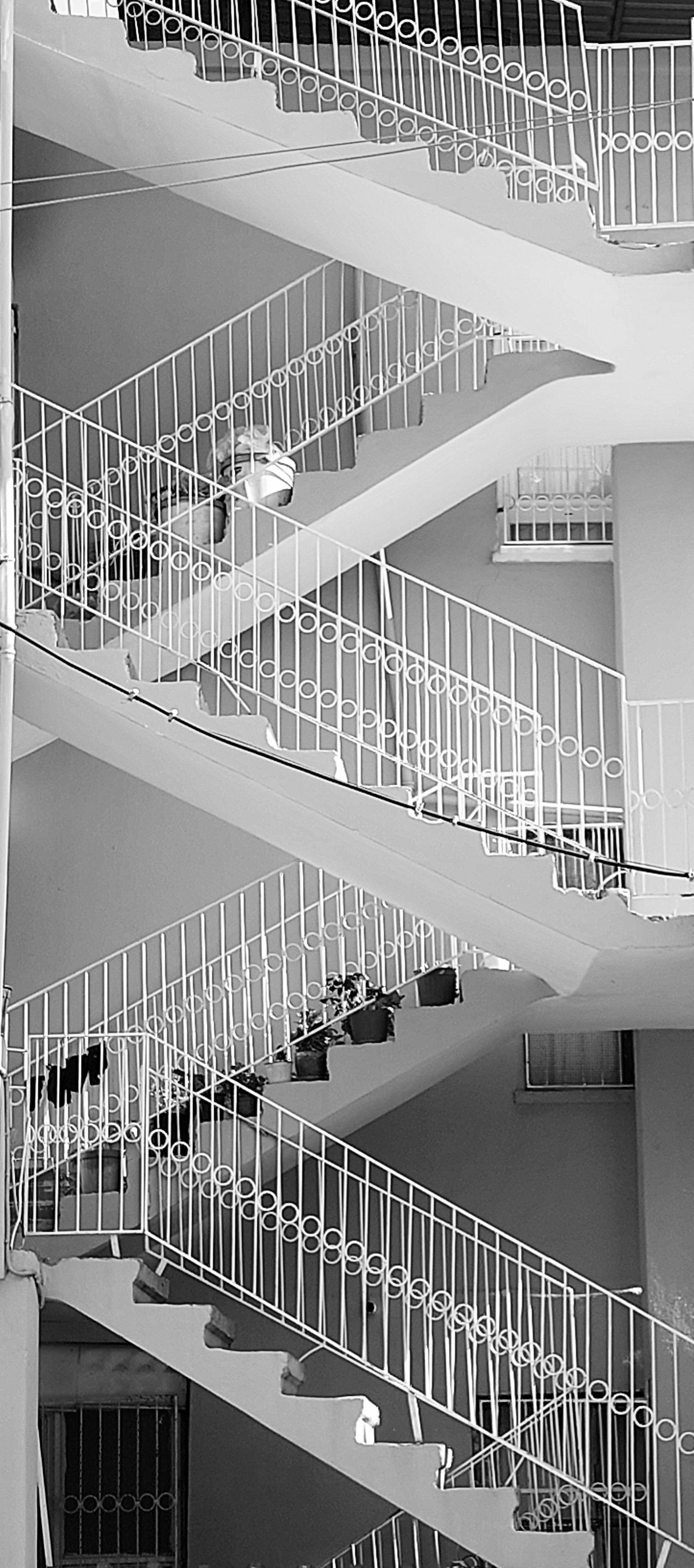 Liverpool supporters waving flags and scarves at Anfield