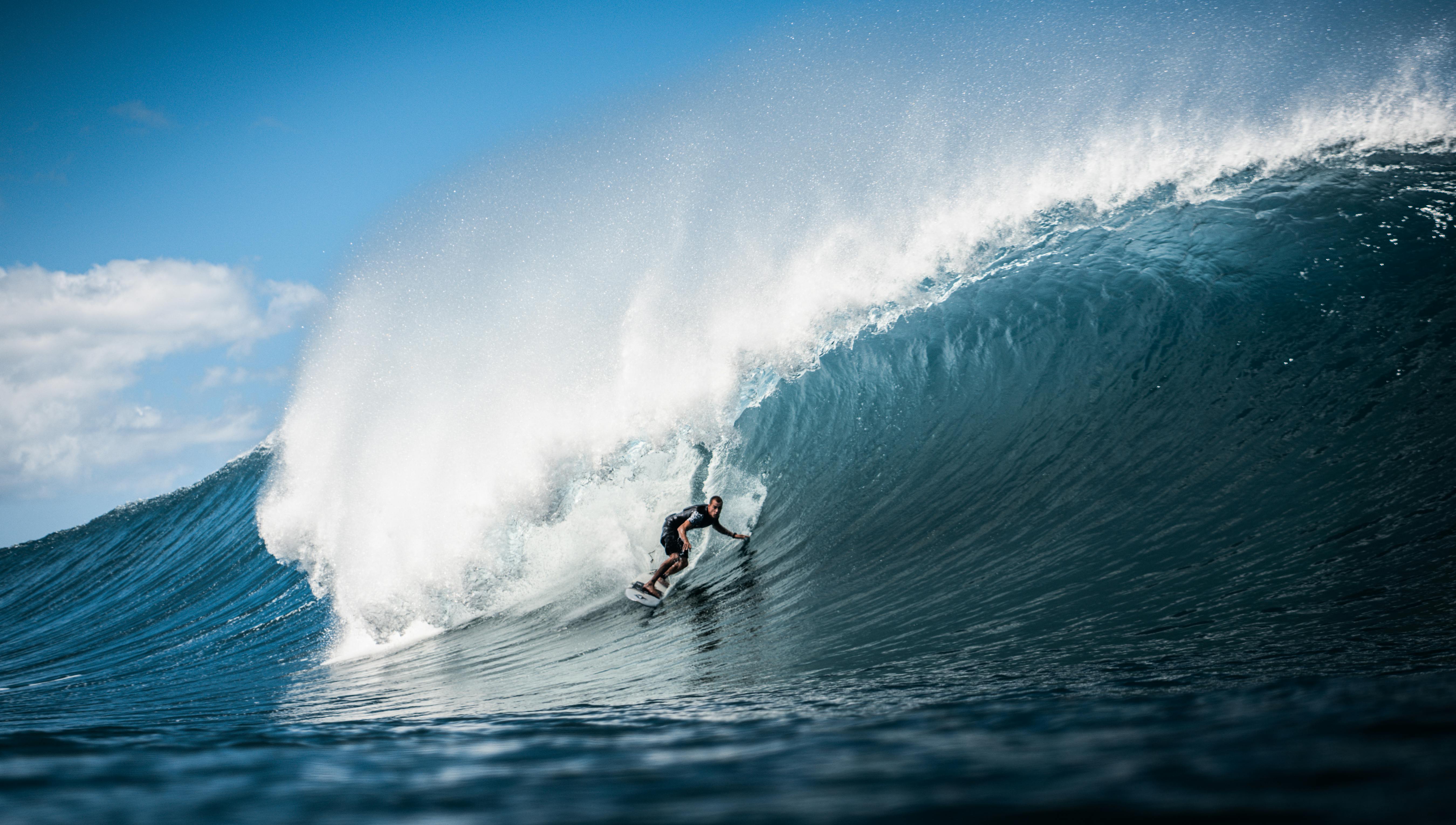 Person in Surfboard in the Wave during Daytime · Free Stock Photo