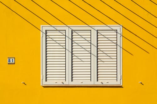 그림자, 기하학적, 노란 벽의 무료 스톡 사진