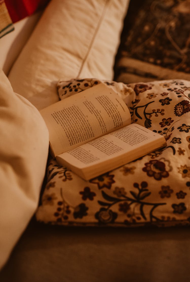 Open Book On Pillow