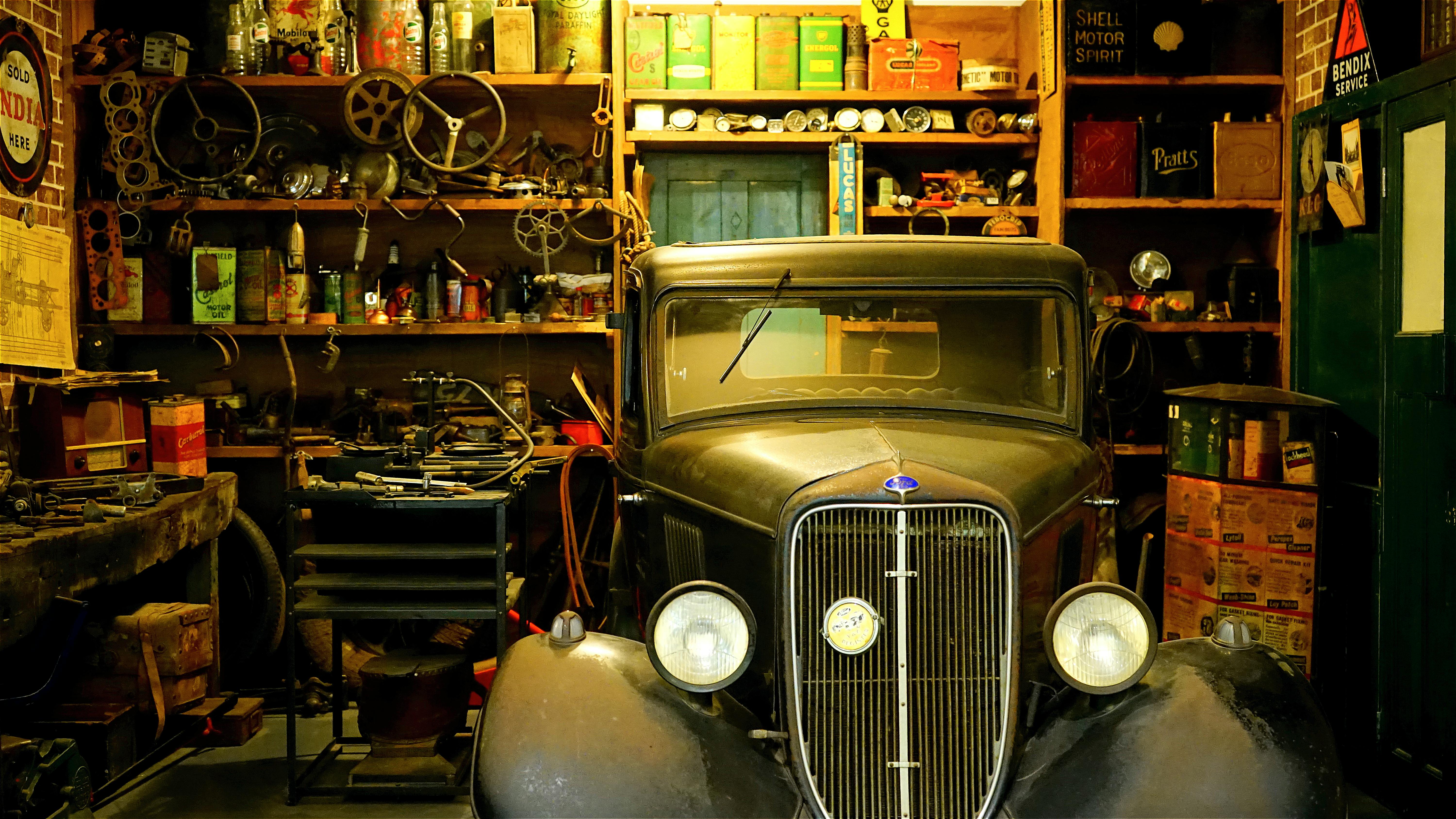 black classic car inside the garage