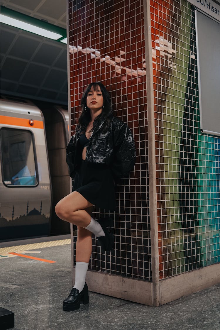 Model Posing In Mini At Subway Station