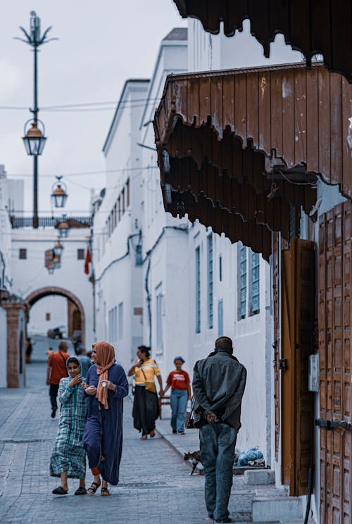 People in Alley in Town