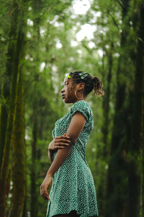 Woman in Sundress Standing in Forest