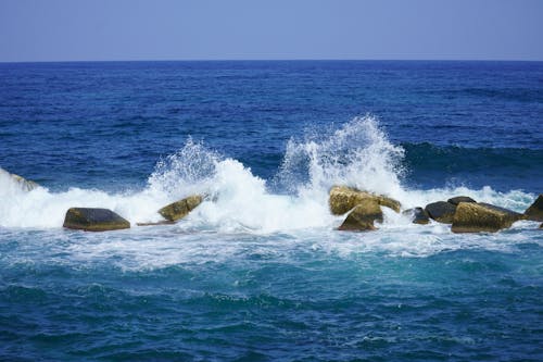 Wave over Rocks on Sea S