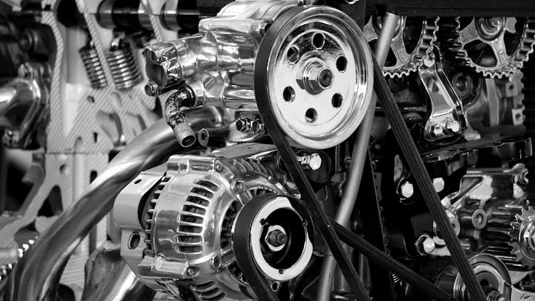 Greyscale Photography Of Car Engine