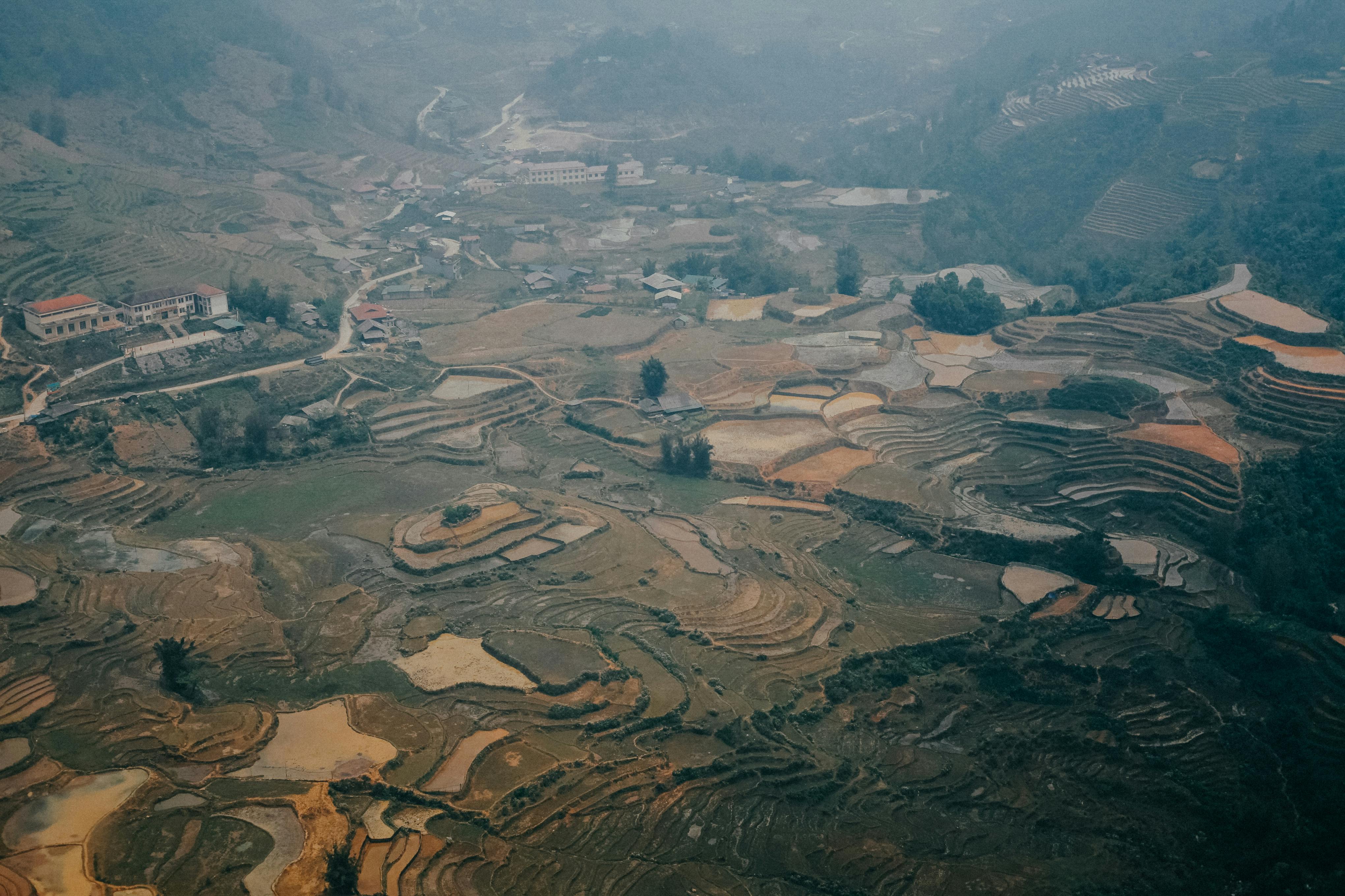 Stunning aerial view of terraced rice fields in a rural landscape, perfect for nature lovers.