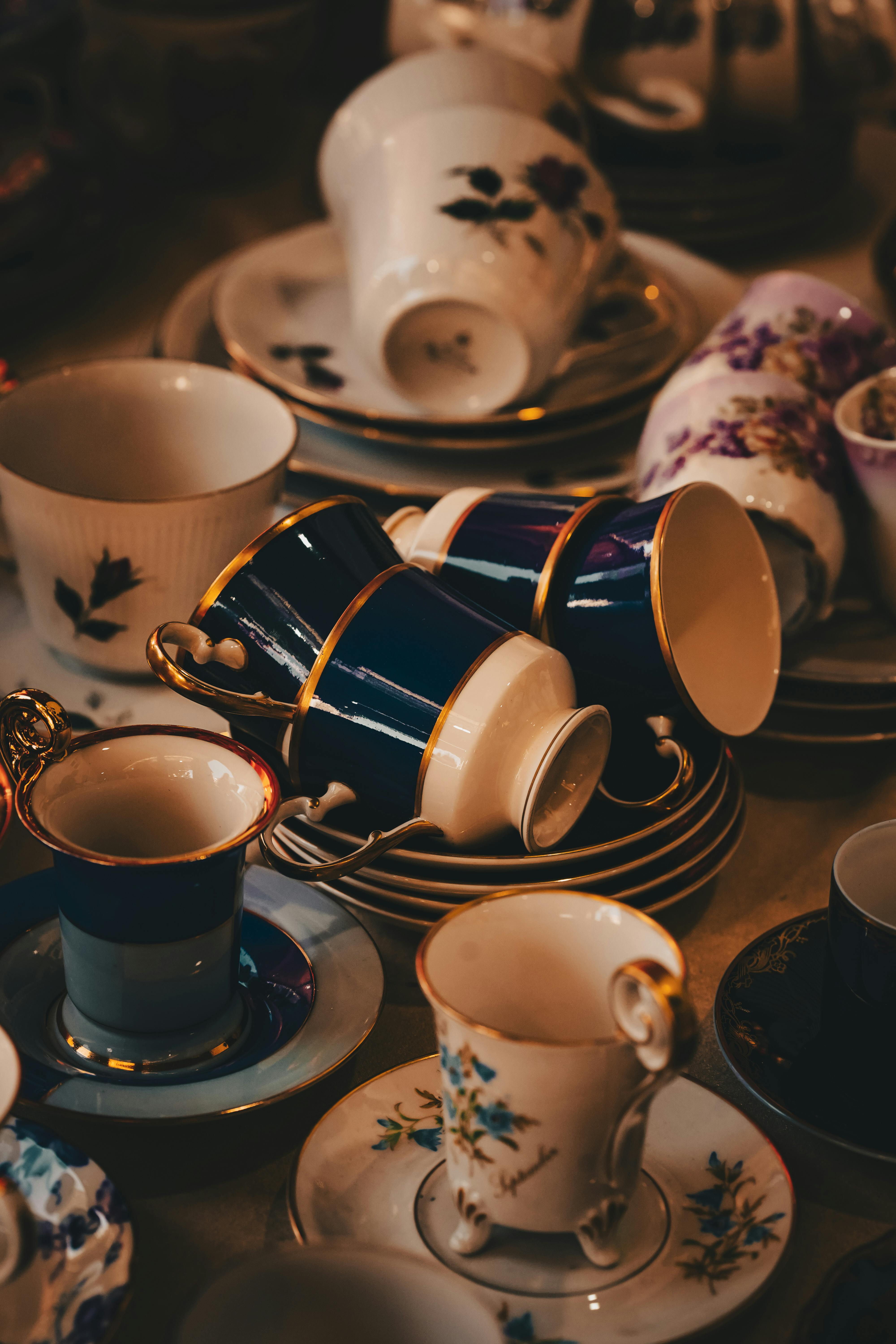 A table full of different types of tea cups · Free Stock Photo