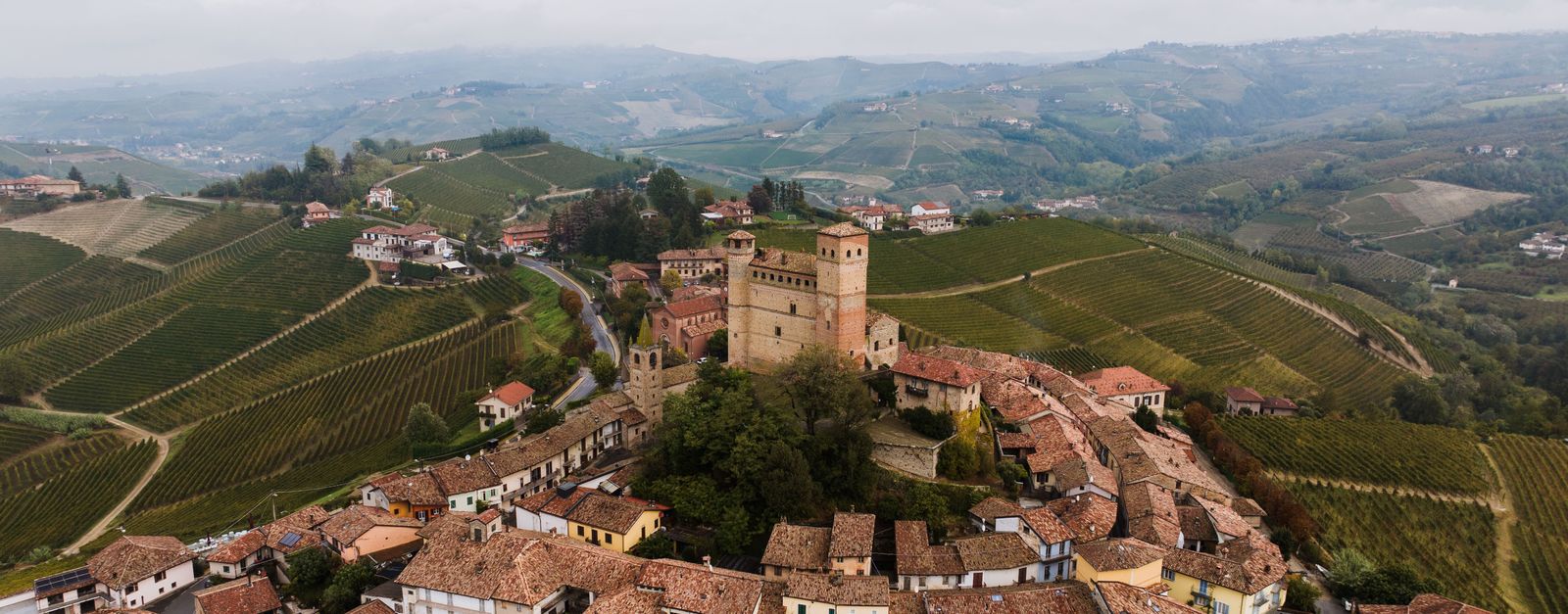 Scenic aerial view of the medieval town and vineyards in Serralunga d'Alba, Piemonte, Italy.