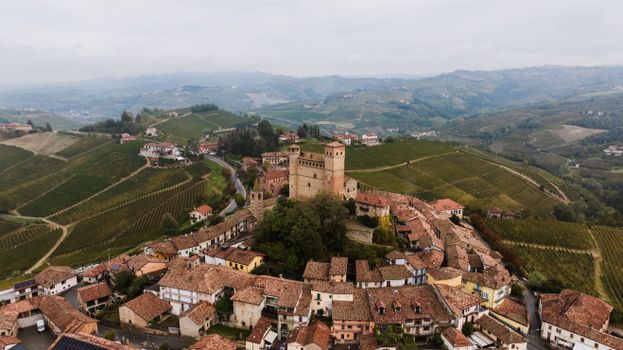 Scenic aerial view of the medieval town and vineyards in Serralunga d'Alba, Piemonte, Italy.
