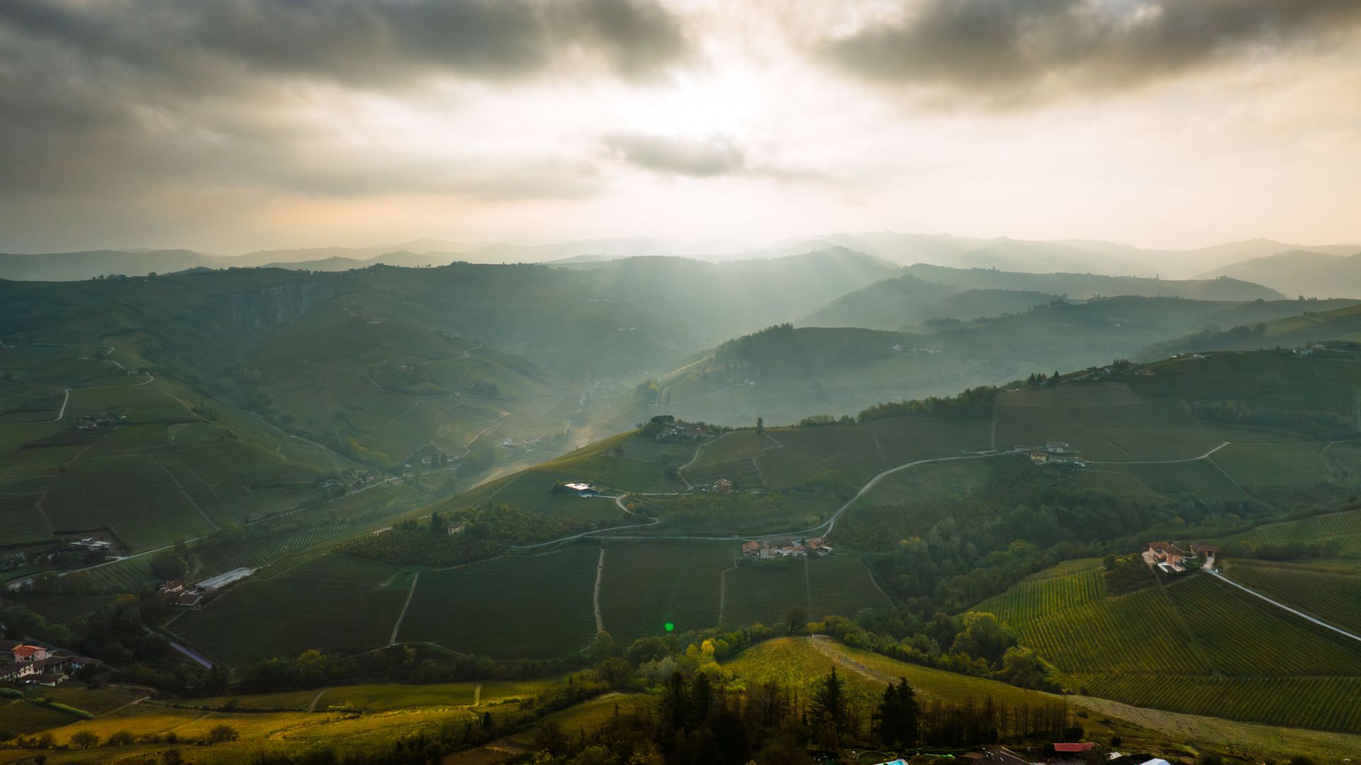 Sunbeams over the hills around Alba