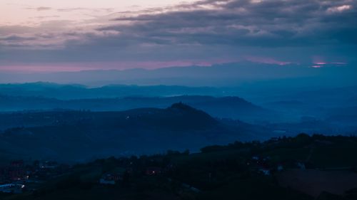 Free Beautiful dawn view of rolling hills and valleys in Costigliole d'Asti, Italy. Stock Photo