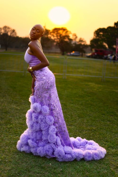 African Woman Wearing Purple Dress in a Park  Free Stock Photo