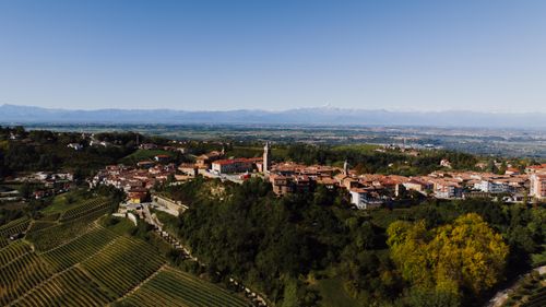 Free A stunning aerial view of La Morra, Piemonte, Italy, showcasing vineyards and historic architecture in summer. Stock Photo