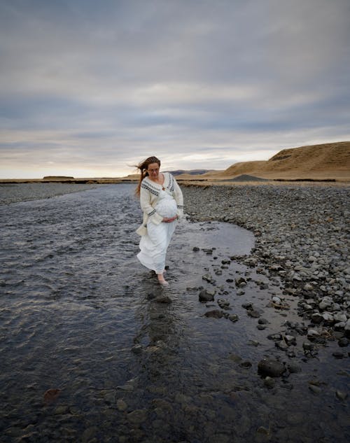 Woman Walking on a Beach 