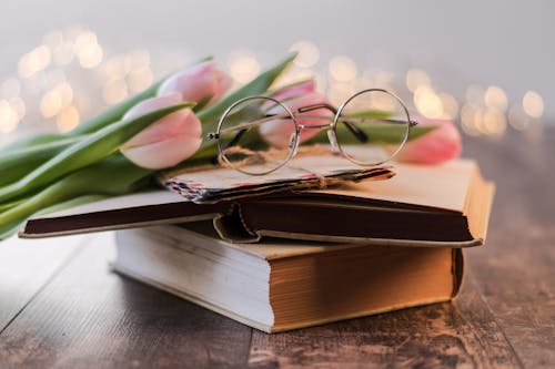 Free Eyeglasses On A Book Stock Photo