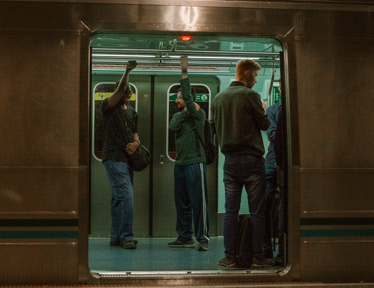 People In A Gray Train