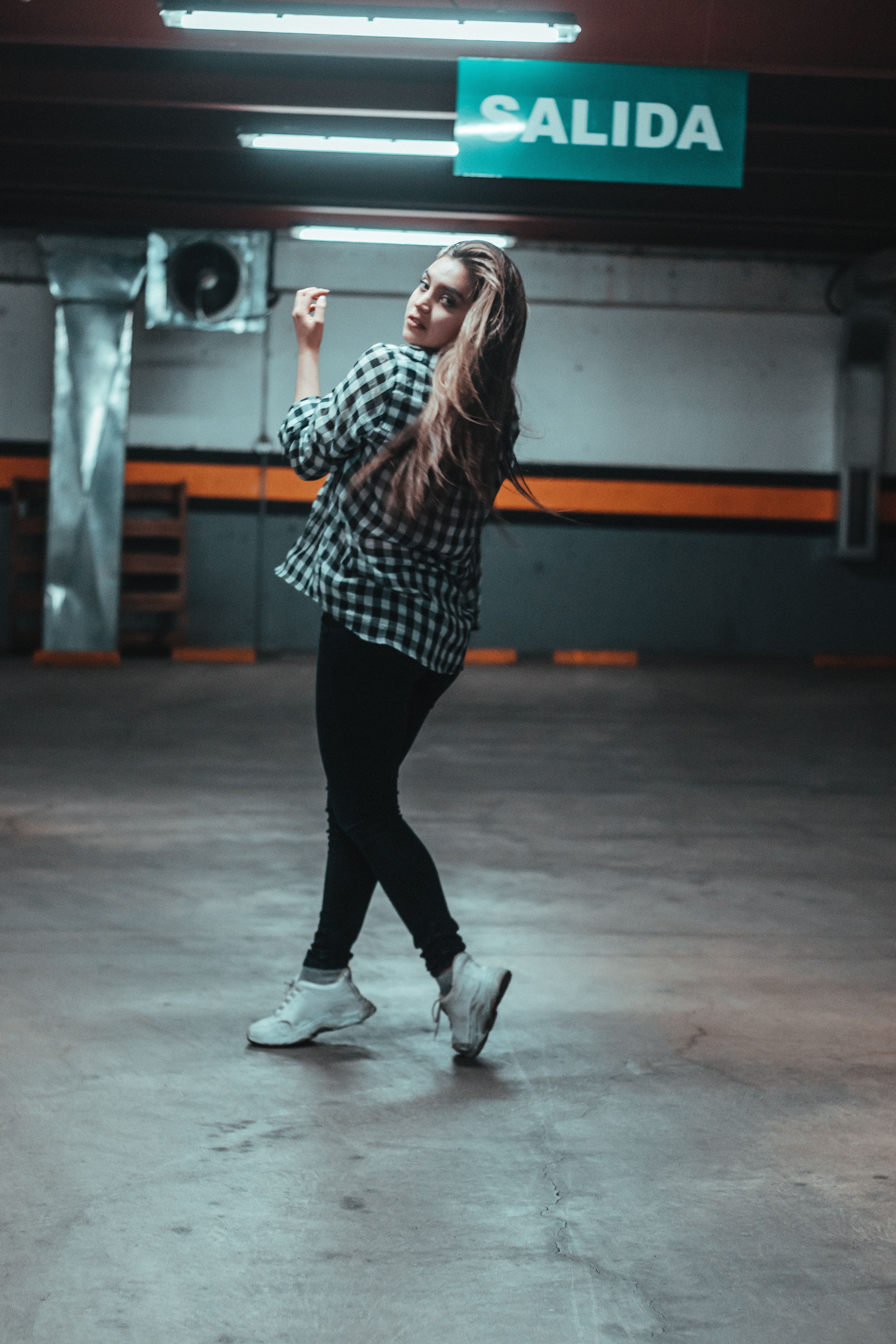 Woman in Check Shirt Dancing · Free Stock Photo