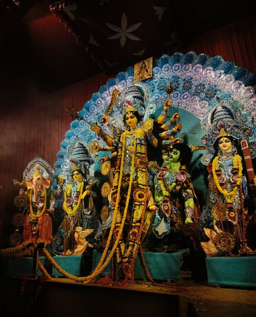 Free Exquisite Hindu goddess statues beautifully decorated at a vibrant religious festival. Stock Photo