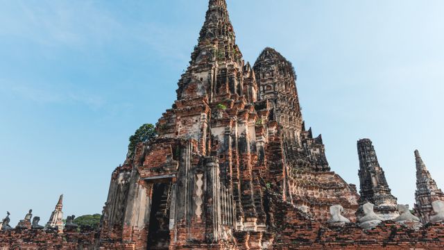 Thailand, Explore the historic ruins of Wat Chaiwatthanaram in Ayutthaya with ancient Buddhist architecture.