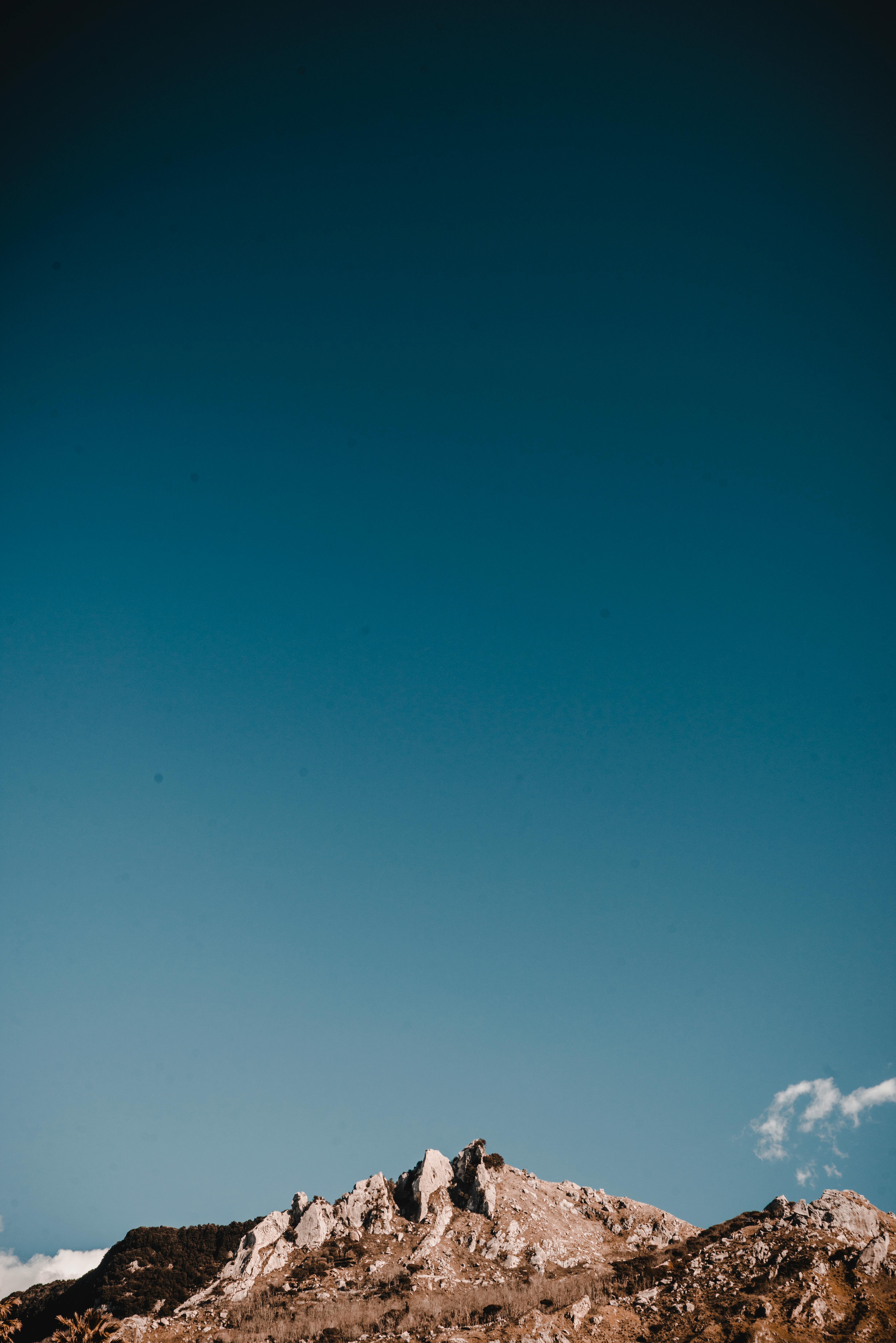 mountain under blue sky