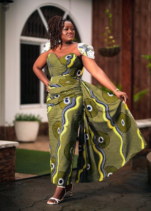 Woman Standing and Posing in Green Dress