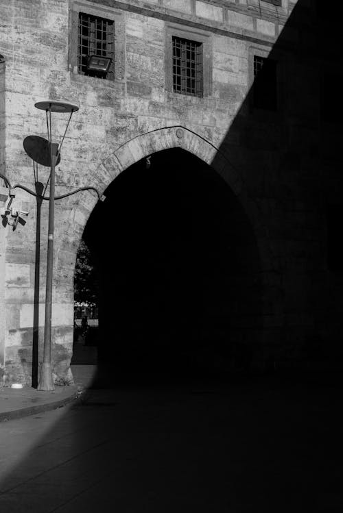 Arch and Tunnel in Shadow in Town