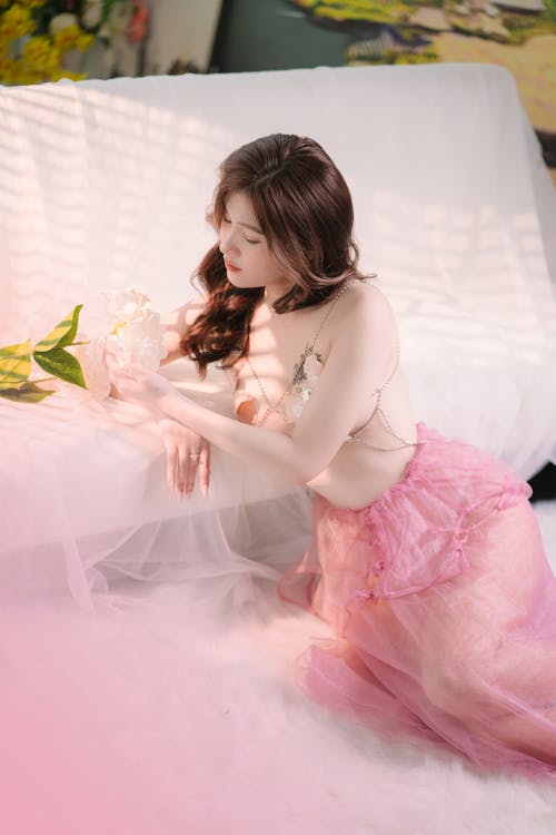 Young Woman Posing in a Pink Tulle Dress