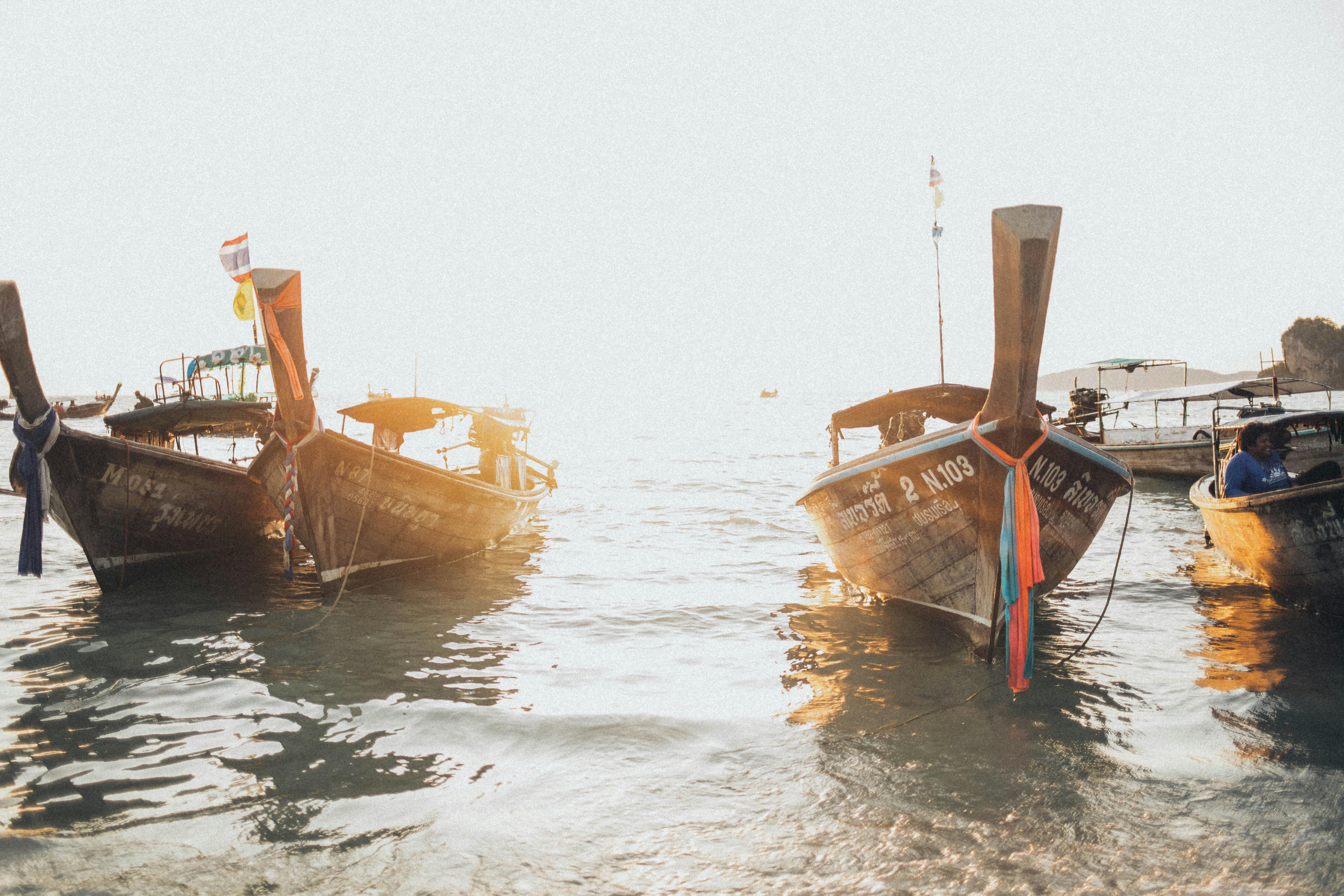 Three Brown Boats · Free Stock Photo