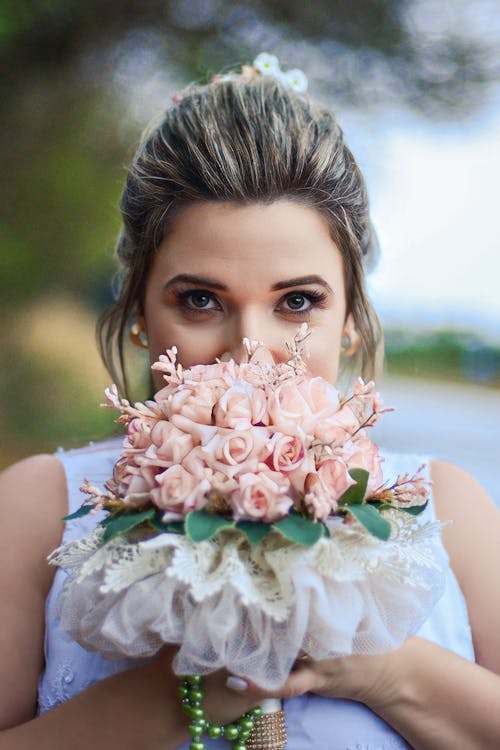 Portrait of Bride with Flowers Bouquet