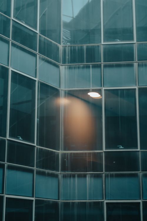 Free Urban glass facade reflecting light. Modern architecture in Pasay, Philippines. Stock Photo