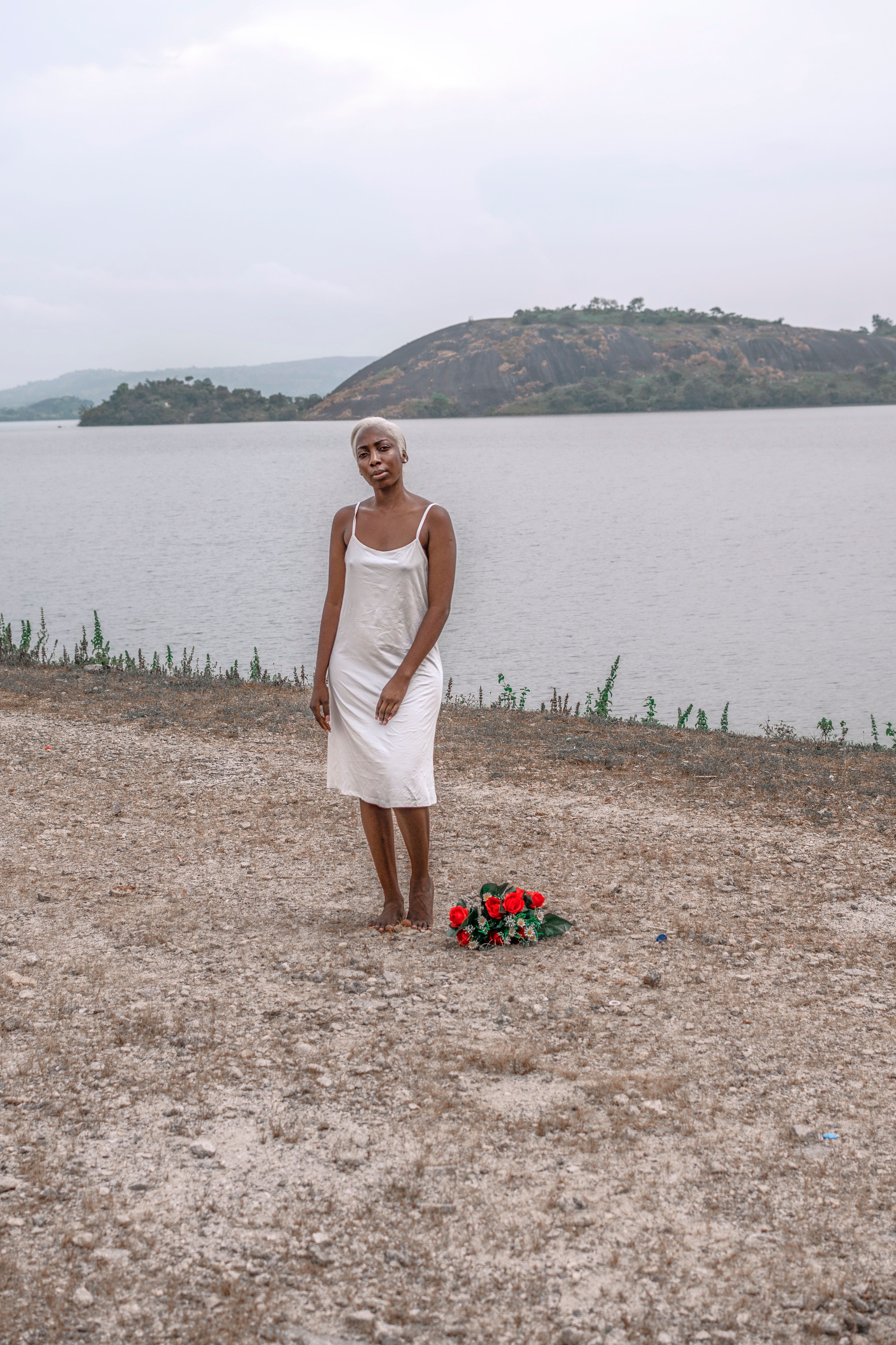 Woman in White Dress Standing by River · Free Stock Photo