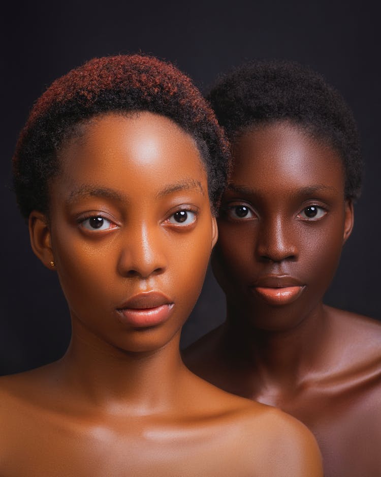 Studio Shot Of Two Young Topless Women 