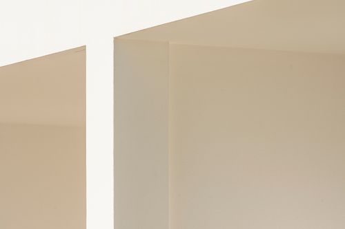 Free Abstract view of minimalist beige interior architecture with light and shadow play. Stock Photo