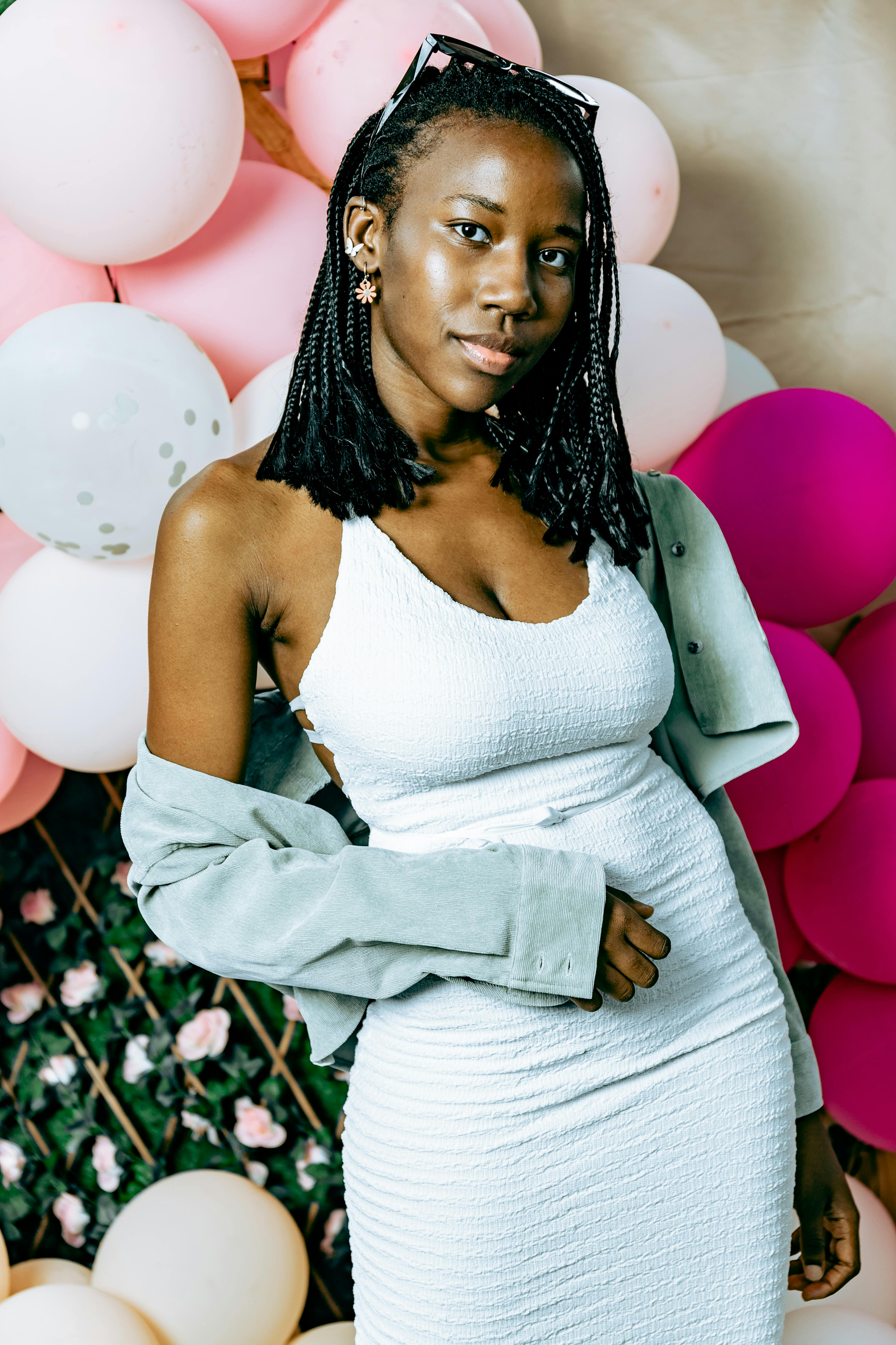 Plus Size Female Model Posing in Blue Dress on White Background