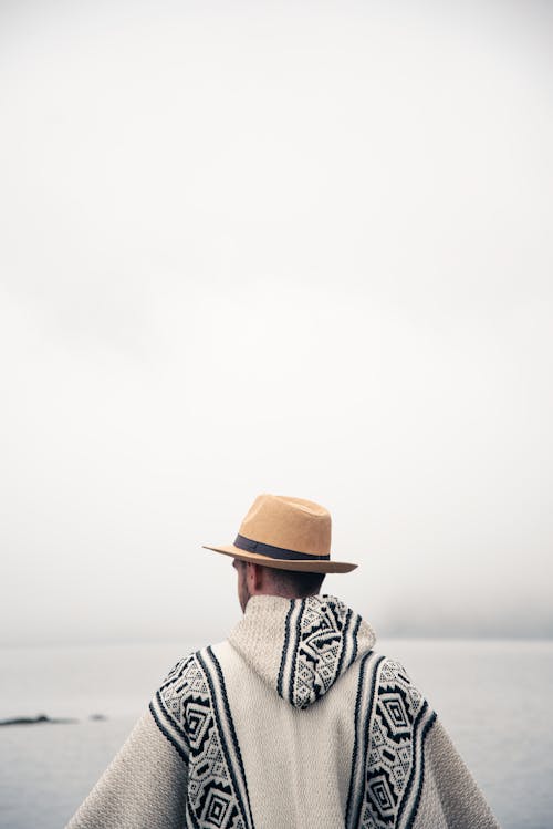 Back View of Man in Hat and Hoodie